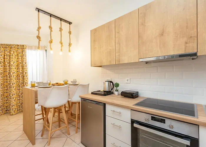 Koukos Loft מלון דירות 4*